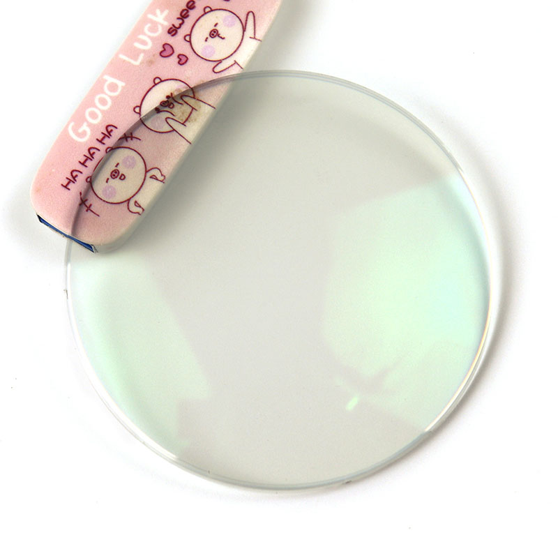 Фотохромная линза 1,56 с синим блоком HMC/SHMC